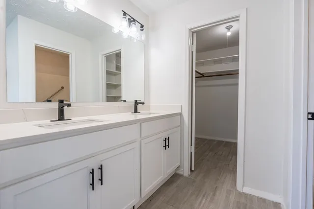 a bathroom with a bathtub and a toilet