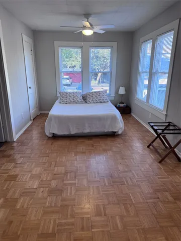 a view of an empty room with a fireplace