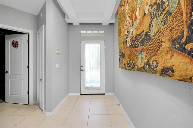 a front view of a house with a yard garage and outdoor seating