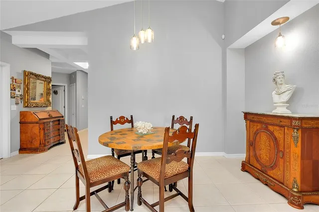 a bed sitting in a room next to a window