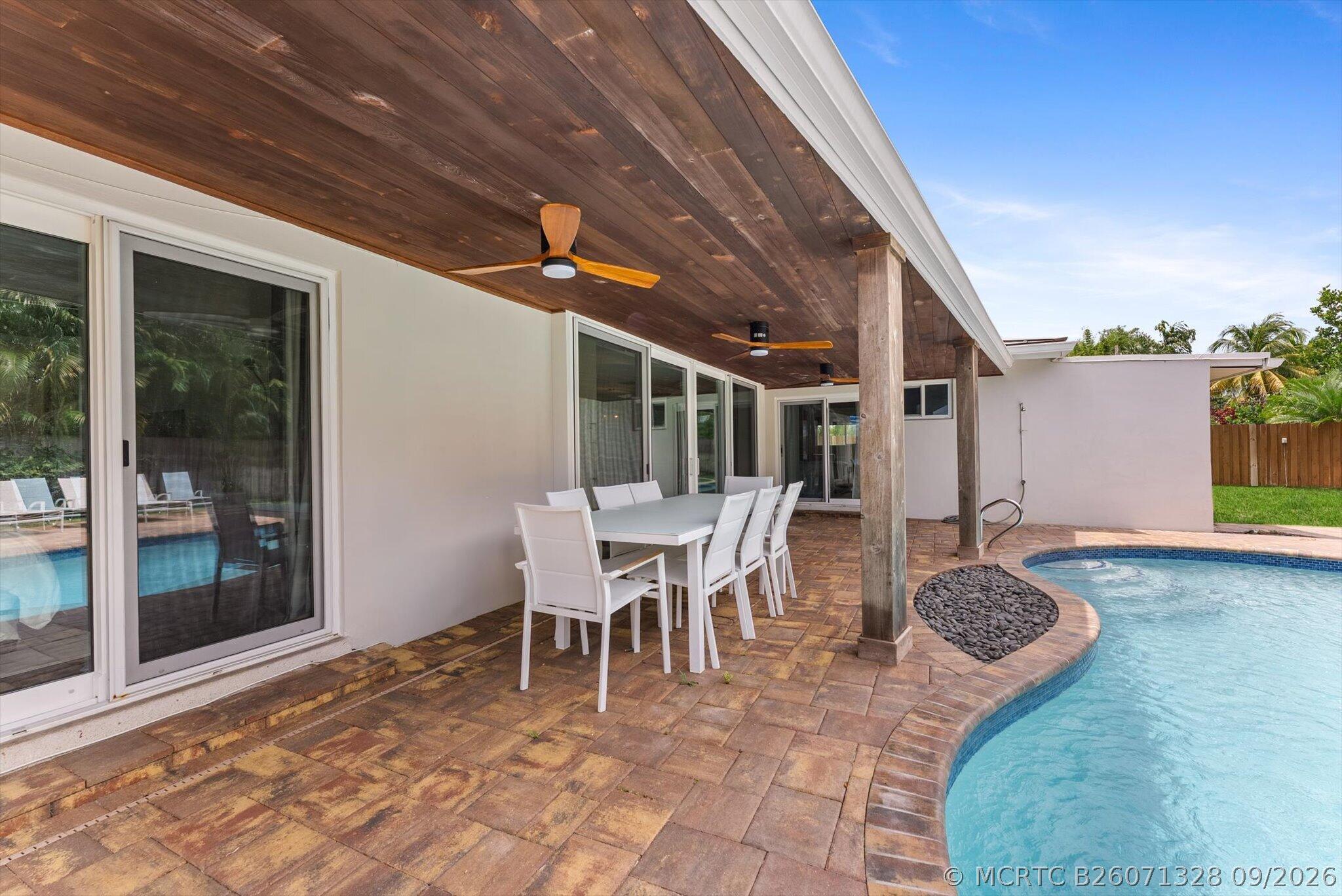 1051 Northwest 3rd Street Boca Raton, FL 33486 - Photo 35 of 52 covered patio