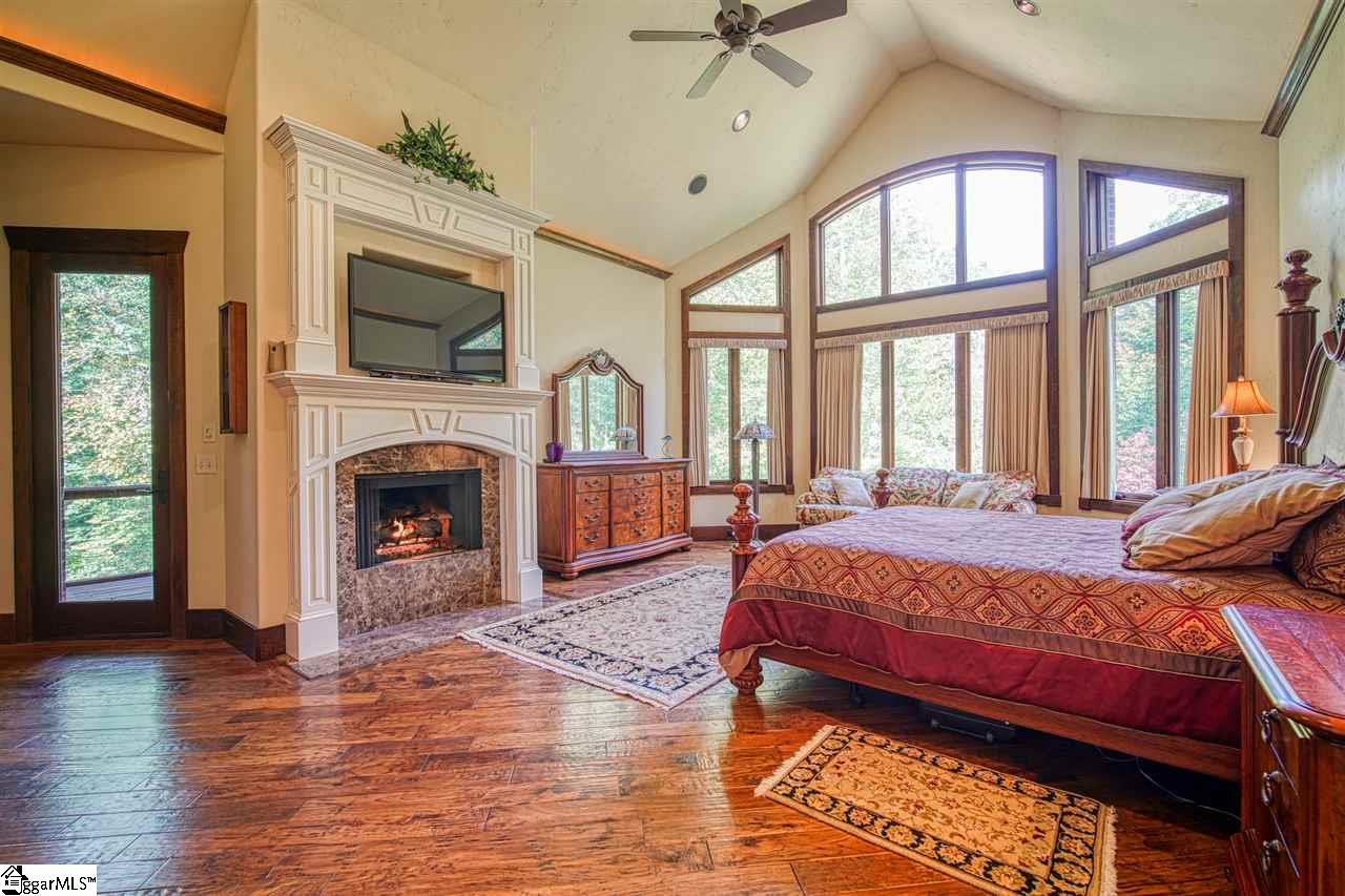 751 Holland Ford Road Pelzer, SC 29669 - Photo 11 of 36 Gas Log Fireplace. Vaulted Ceiling. Rope Lighting