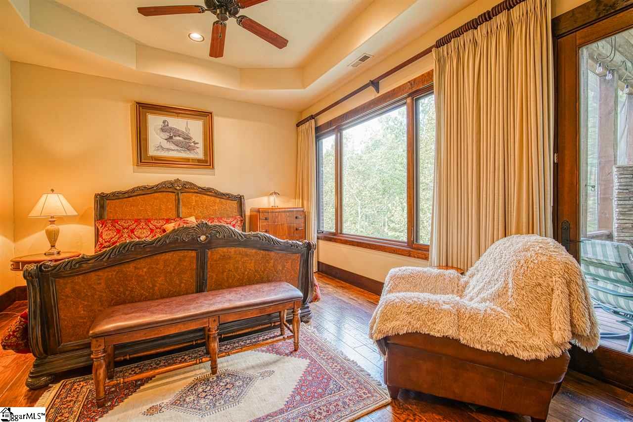 751 Holland Ford Road Pelzer, SC 29669 - Photo 18 of 36 Guest Suite 1 or Second Master Suite with attached full bath and screen porch access