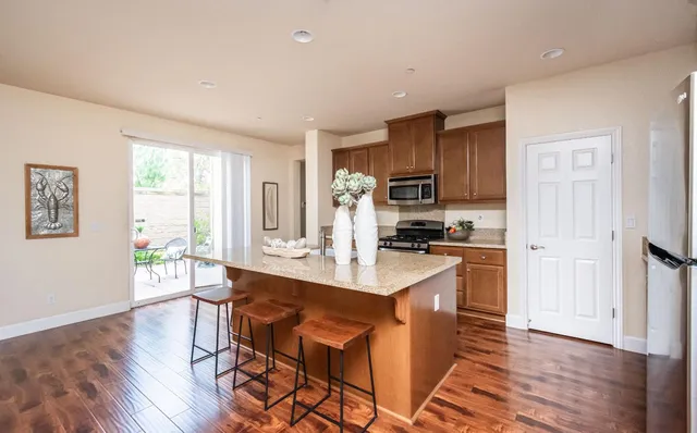 a view of a hallway with washer and dryer