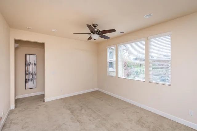 a spacious bathroom with a double vanity sink mirror and next