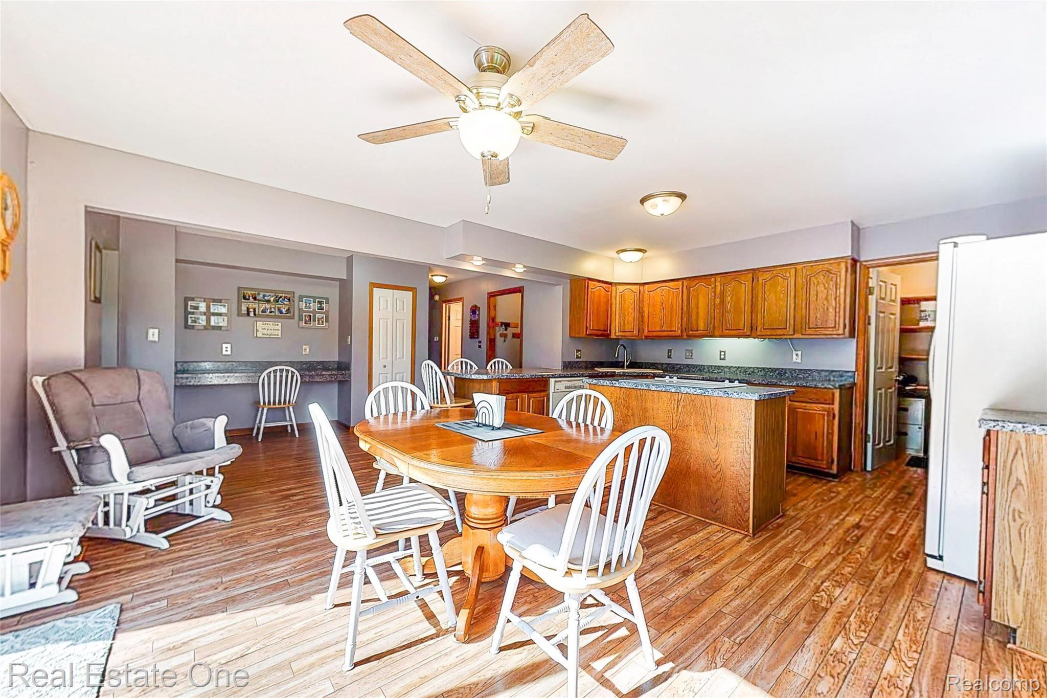8120 Green Road Fenton, MI 48430 - Photo 22 of 46 I can not get across how massive this kitchen size feels. Breakfast nook are can fit a LARGE table.