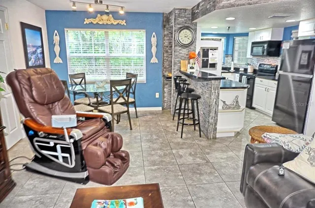 a view of a livingroom and dining room