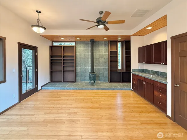 a view of a porch and wooden floor