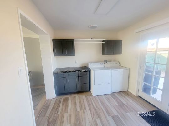 1512 South Mahan Street Ridgecrest, CA 93555 - Photo 15 of 16 a room with a sink and a stove top oven