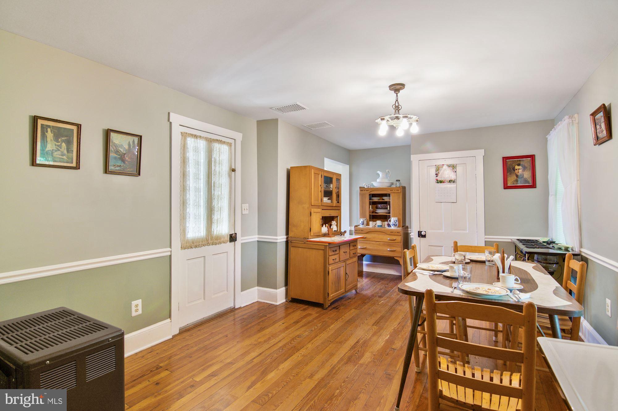 11023 Elk Run Road Catlett, VA 20119 - Photo 11 of 38 Dining room off kitchen cabinets do not stay
