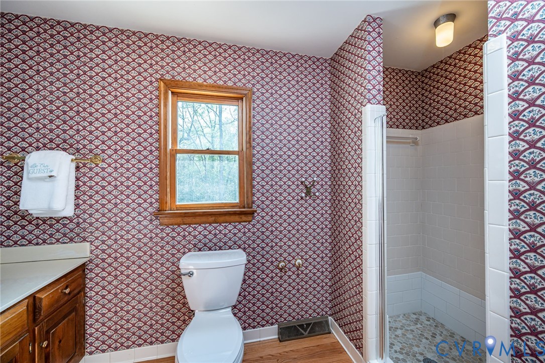 5301 Krag Road Chester, VA 23831 - Photo 23 of 48 1st floor primary bath with new tile!