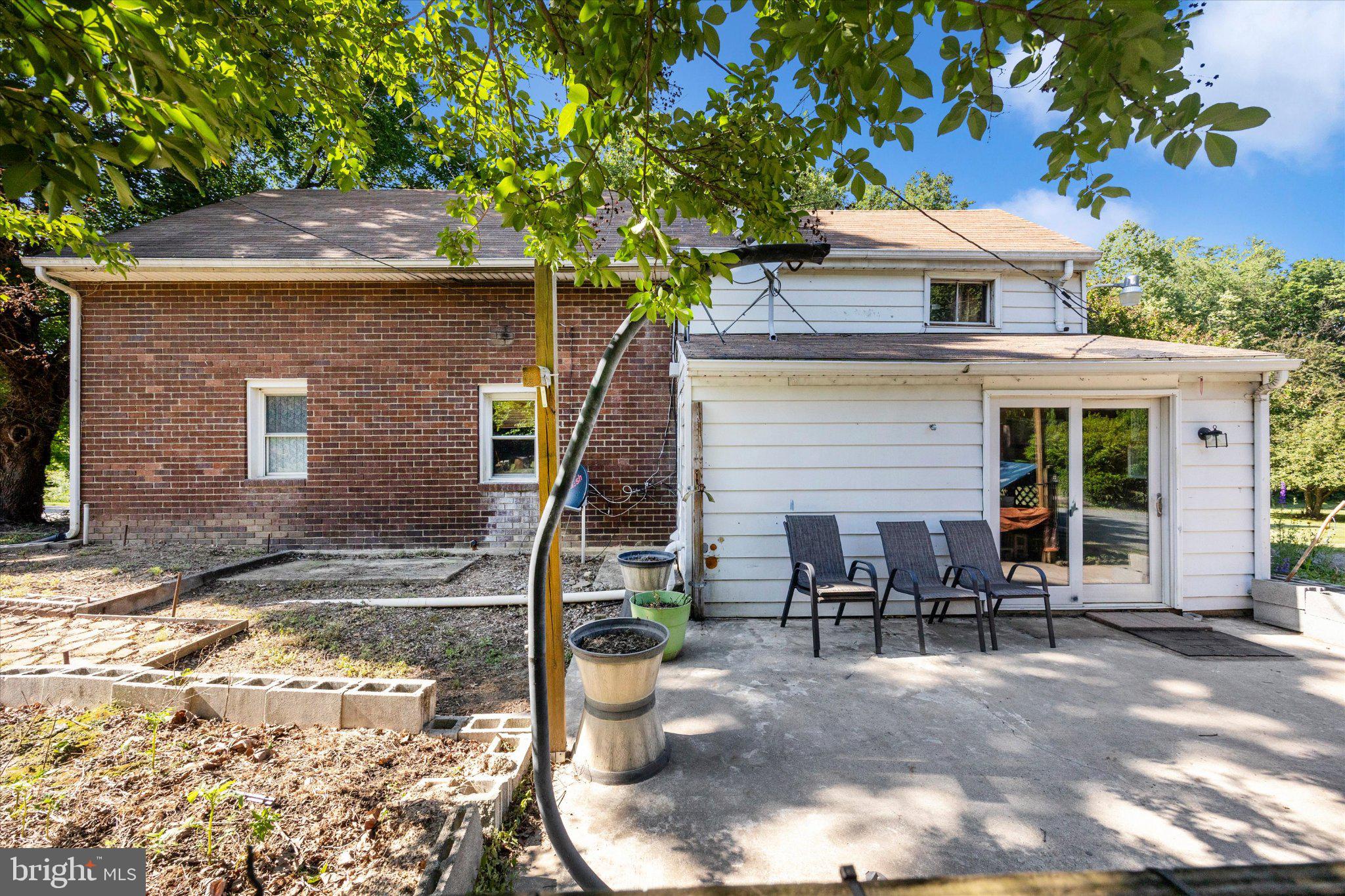 14721 Albert Staub Road Thurmont, MD 21788 - Photo 26 of 46 a backyard of a house with seating space