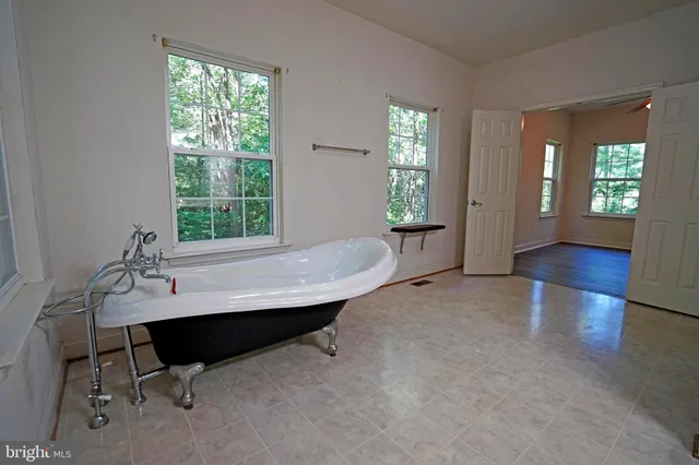 a workspace with furniture and window