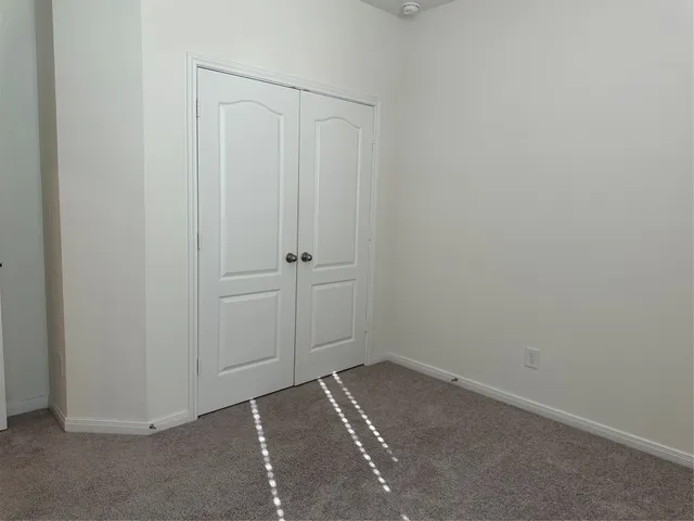 an empty room with closet