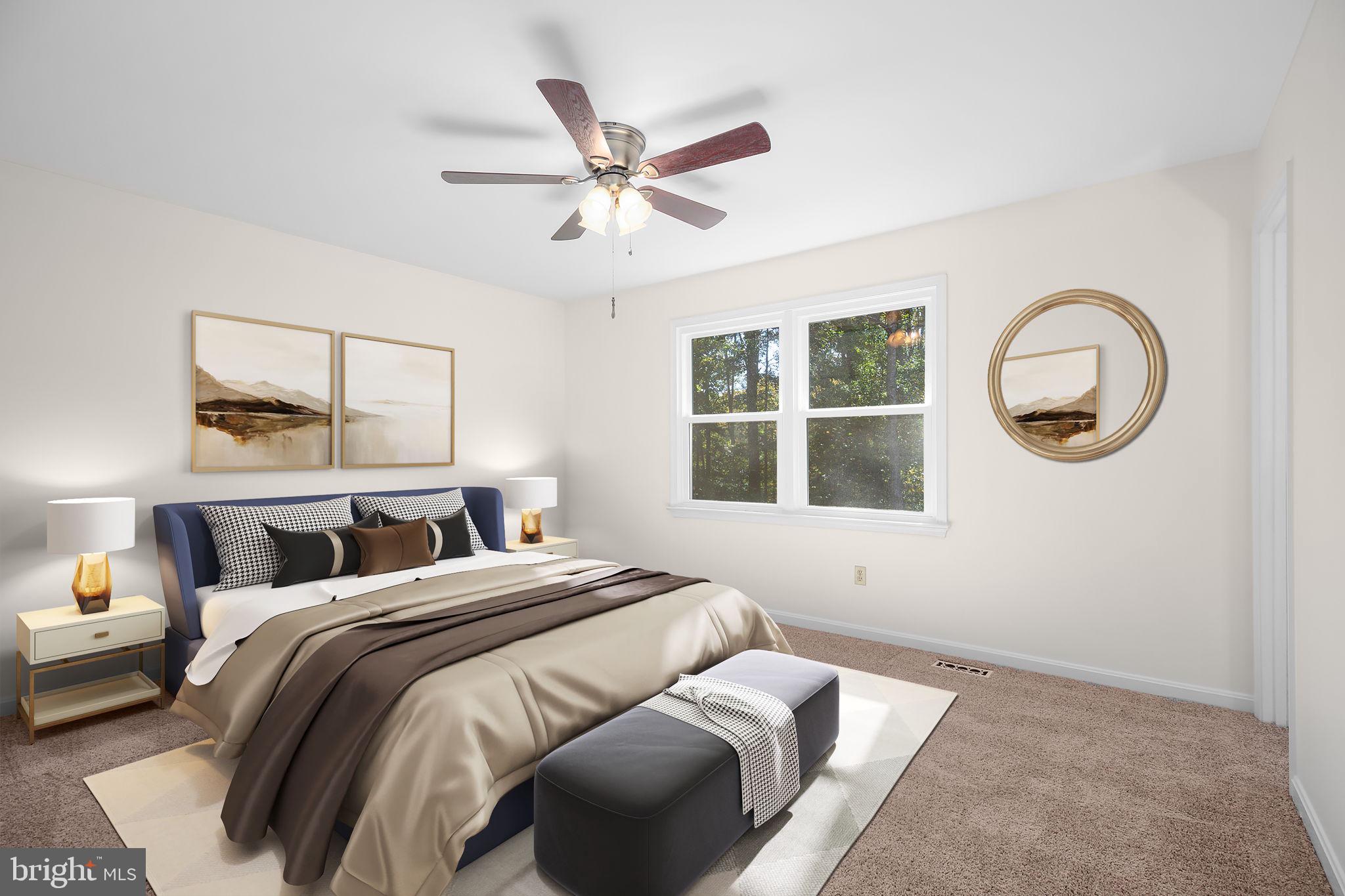 8 Rutledge Cove Ruther Glen, VA 22546 - Photo 15 of 46 a bedroom with a large bed and a window