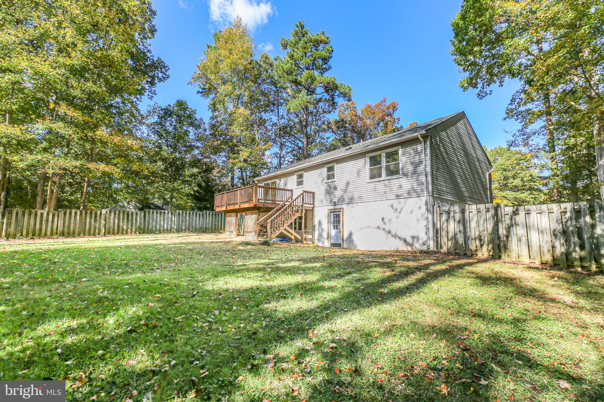 8 Rutledge Cove Ruther Glen, VA 22546 - Photo 28 of 46 a view of a house with a yard