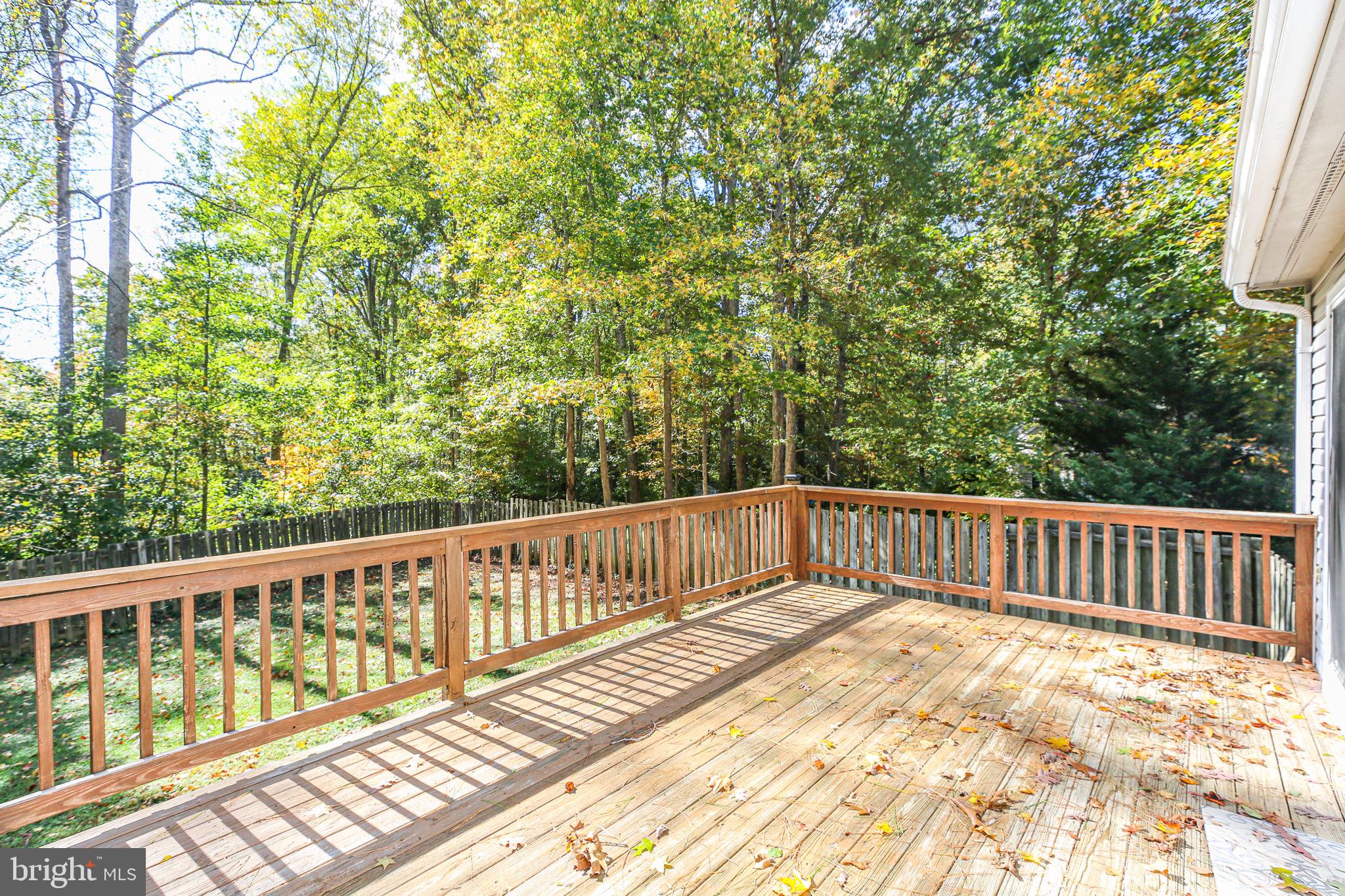 8 Rutledge Cove Ruther Glen, VA 22546 - Photo 32 of 46 a view of balcony with wooden floor and fence
