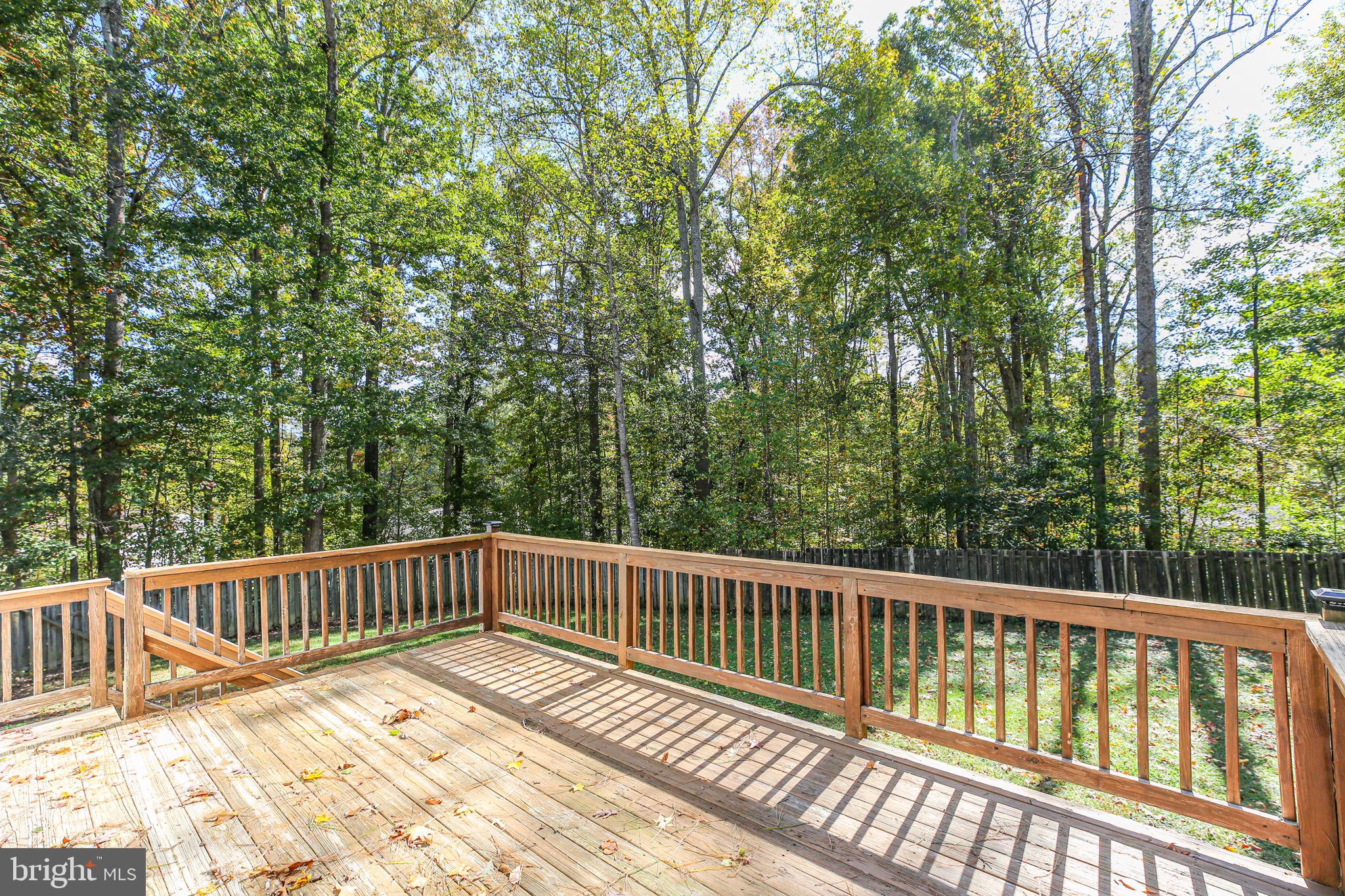 8 Rutledge Cove Ruther Glen, VA 22546 - Photo 33 of 46 a view of balcony with wooden floor and outdoor space