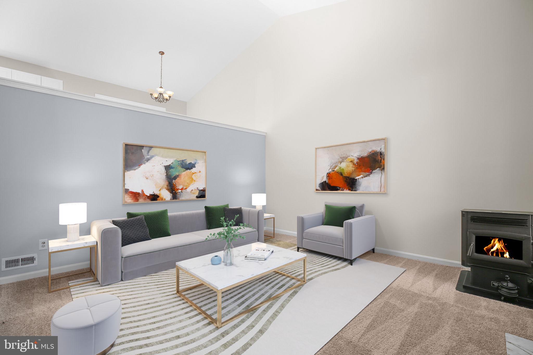 8 Rutledge Cove Ruther Glen, VA 22546 - Photo 4 of 46 a living room with furniture and a fireplace