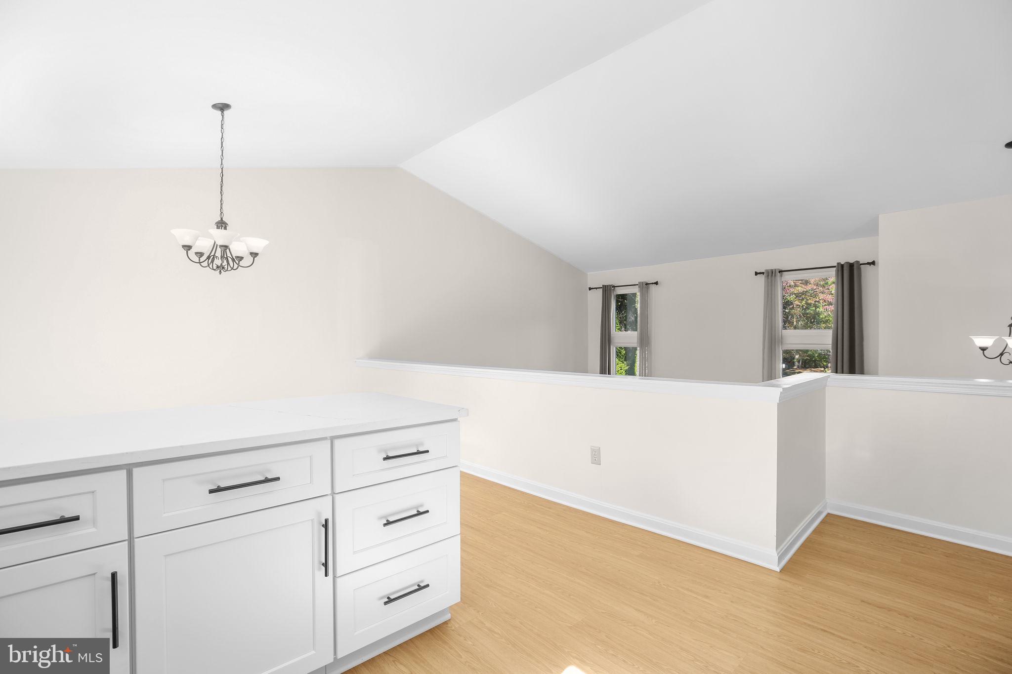 8 Rutledge Cove Ruther Glen, VA 22546 - Photo 10 of 46 a living room with cabinets