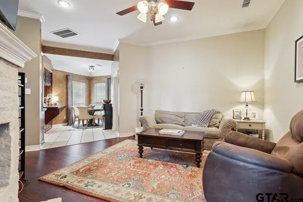 a living room with furniture and a rug