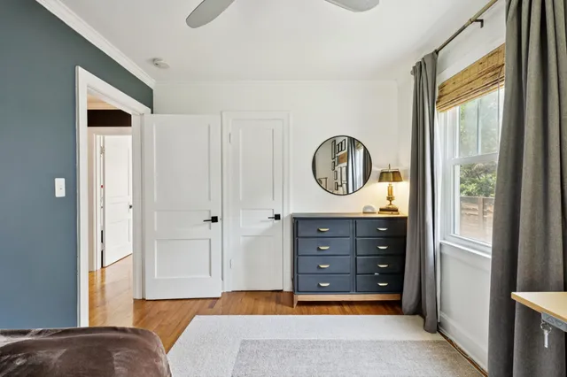 a view of living room and wooden floor