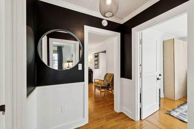 a room with gym equipment and a mirror