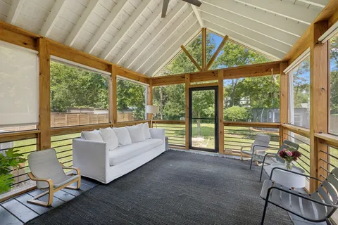 a view of house with outdoor seating