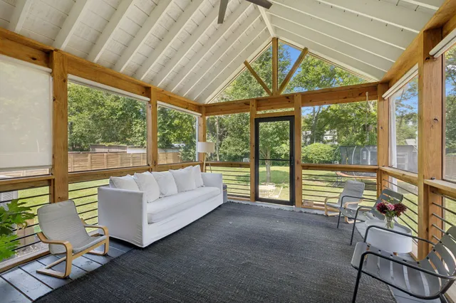 a view of house with outdoor seating