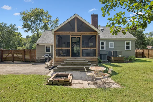 an aerial view of residential house with outdoor space