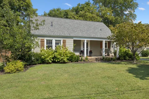 a view of a house with a garden
