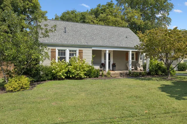 a view of a house with a garden