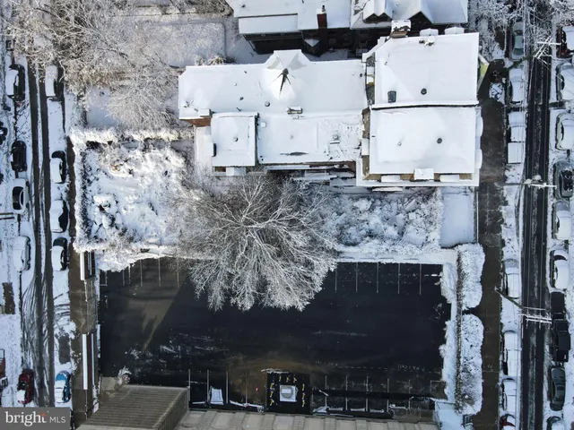 a view of a couple of cars parked in a parking lot
