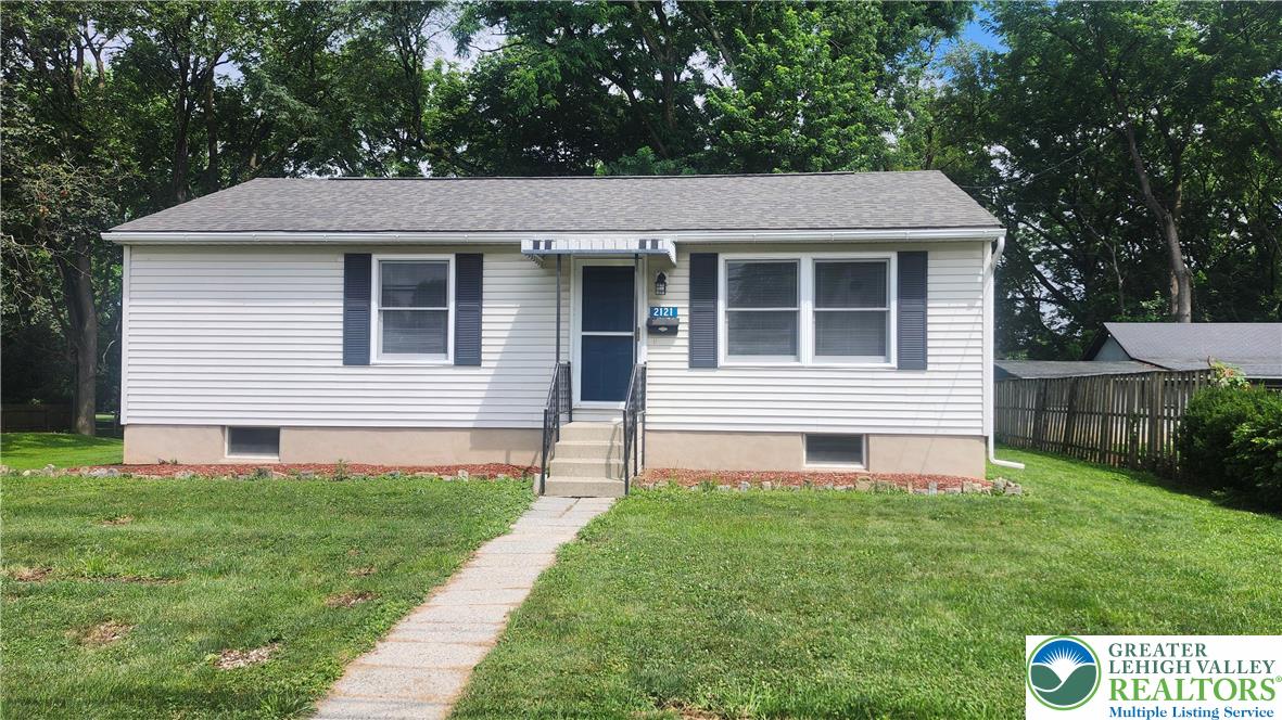 2121 Grove Street Allentown, PA 18104 - Photo 1 of 7 a front view of a house with a yard