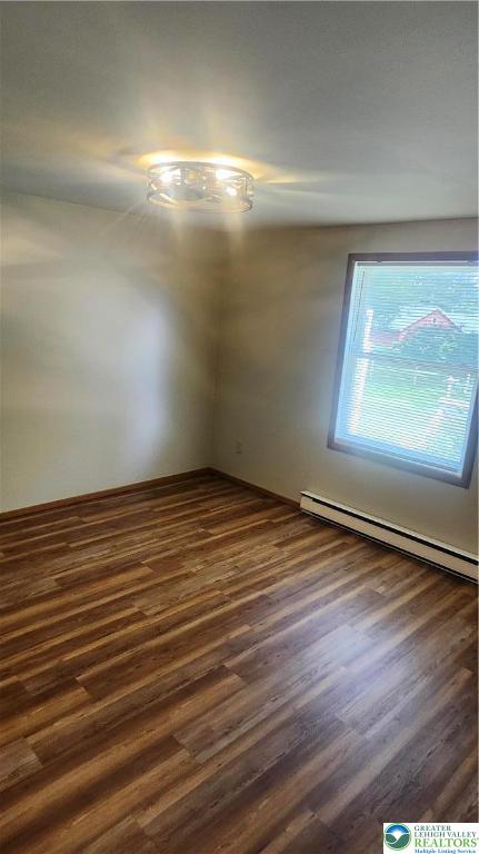 2121 Grove Street Allentown, PA 18104 - Photo 6 of 7 an empty room with wooden floor and windows