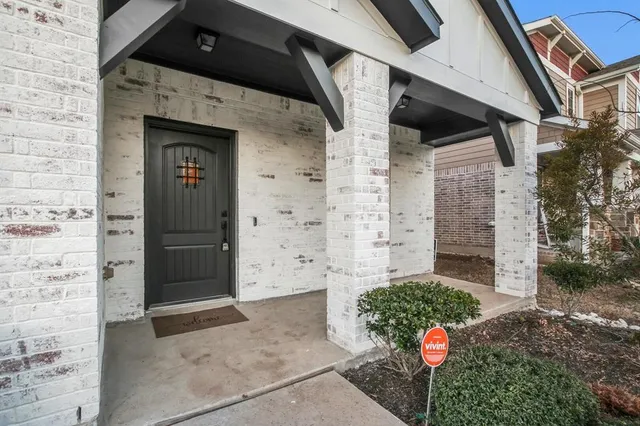 a front view of a house with an outdoor space