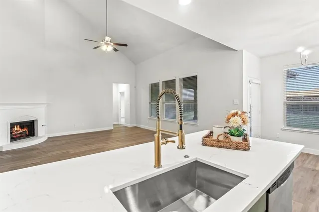 a living room with hard wood floor