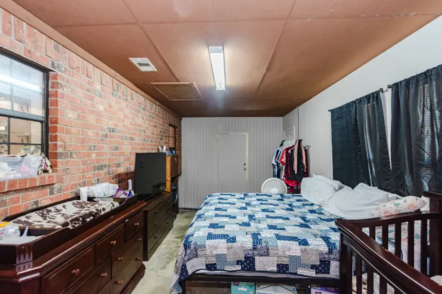 a kitchen with a stove and a refrigerator