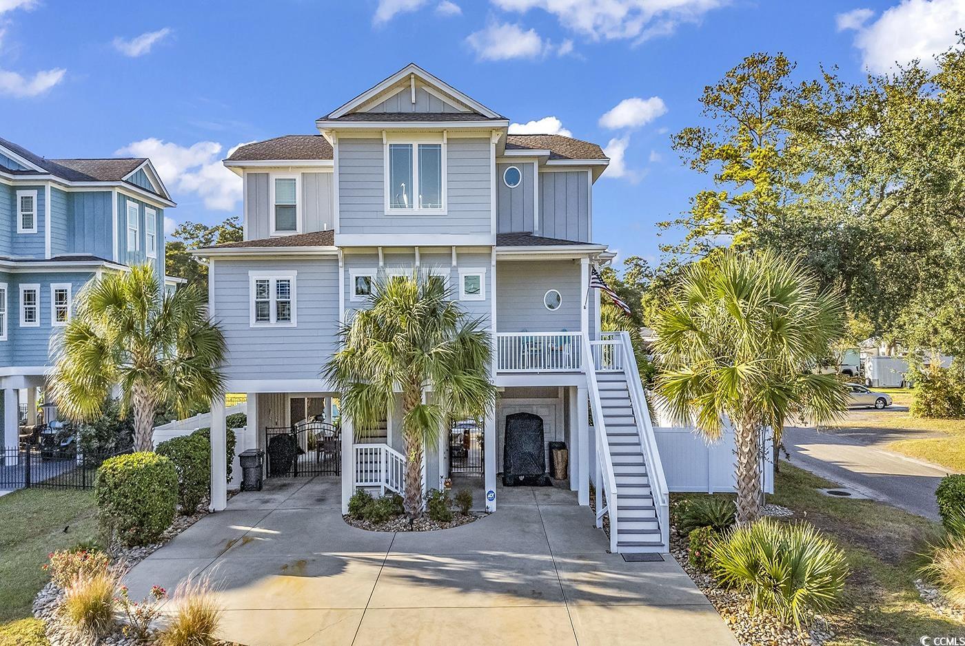 519 1st Street Murrells Inlet, SC 29576 - Photo 1 of 40 Beach home with a porch