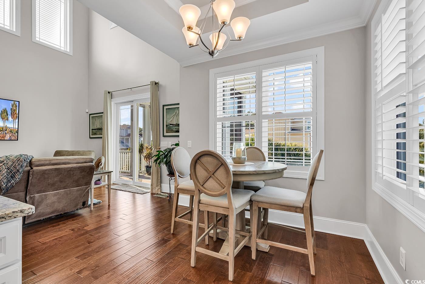 519 1st Street Murrells Inlet, SC 29576 - Photo 20 of 40 Dining area featuring ornamental molding, a notabl