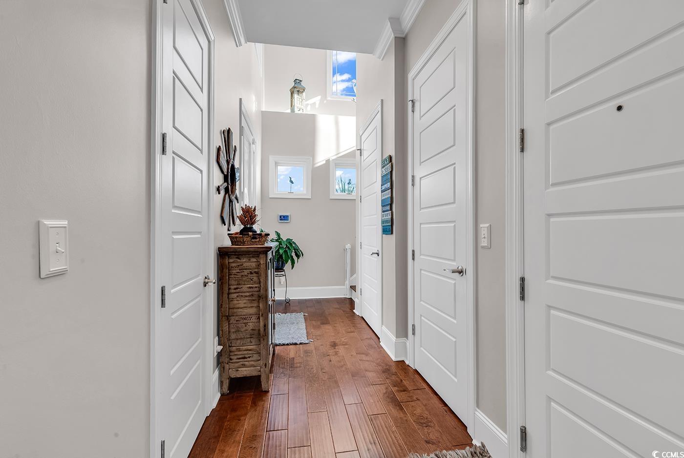 519 1st Street Murrells Inlet, SC 29576 - Photo 10 of 40 Hallway featuring dark hardwood / wood-style floor