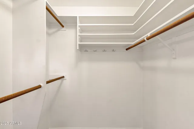 a bathroom with a toilet and shower