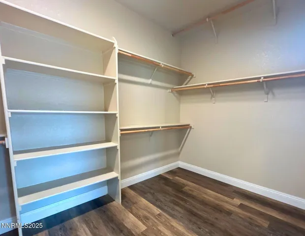 a view of an empty walk in closet