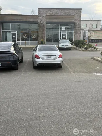 a car parked in front of a house