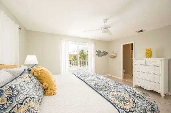 a bathroom with a double vanity sink and mirror