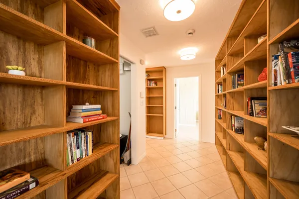 a view of storage and utility room with washer and dryer