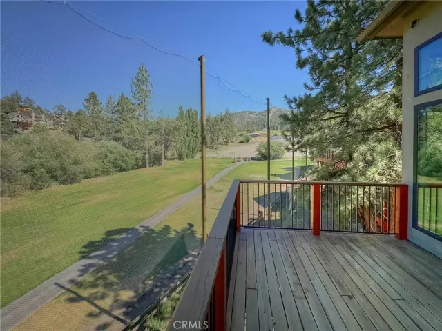 a view of a balcony with ocean