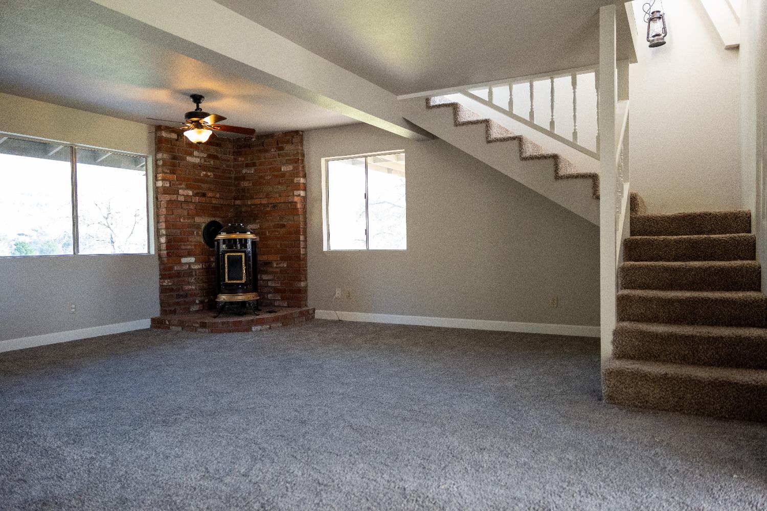 42560 Ranger Cir Way Coarsegold, CA 93614 - Photo 18 of 44 a view of livingroom with stairs and furniture