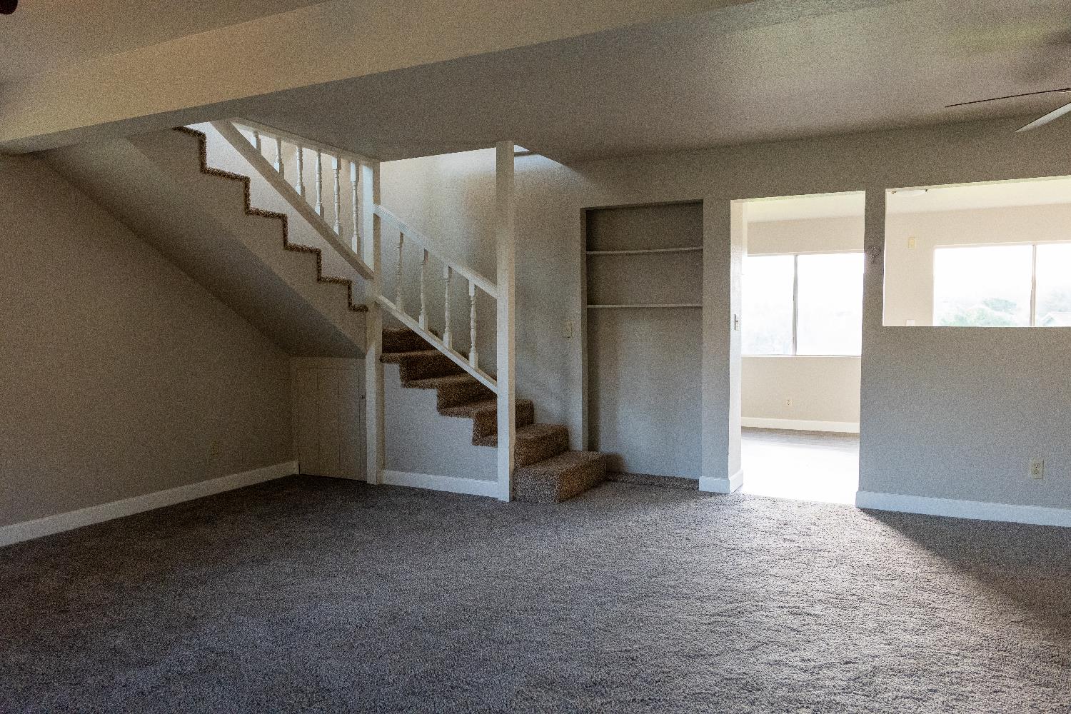 42560 Ranger Cir Way Coarsegold, CA 93614 - Photo 20 of 44 a view of an empty room with windows