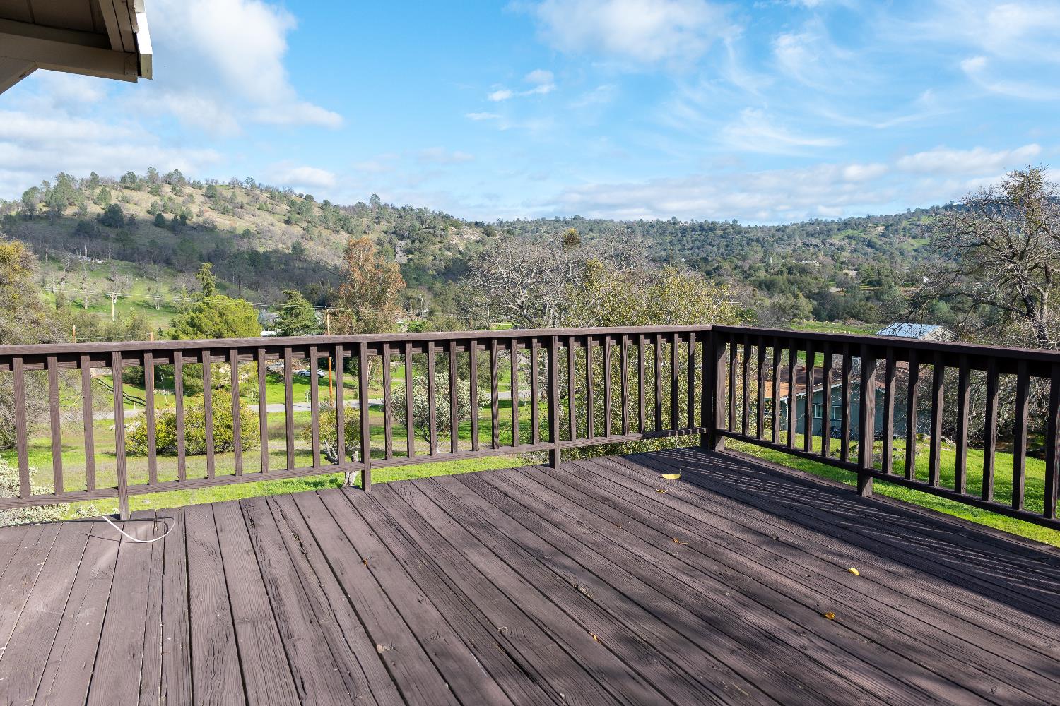 42560 Ranger Cir Way Coarsegold, CA 93614 - Photo 38 of 44 a view of wooden balcony with outdoor space